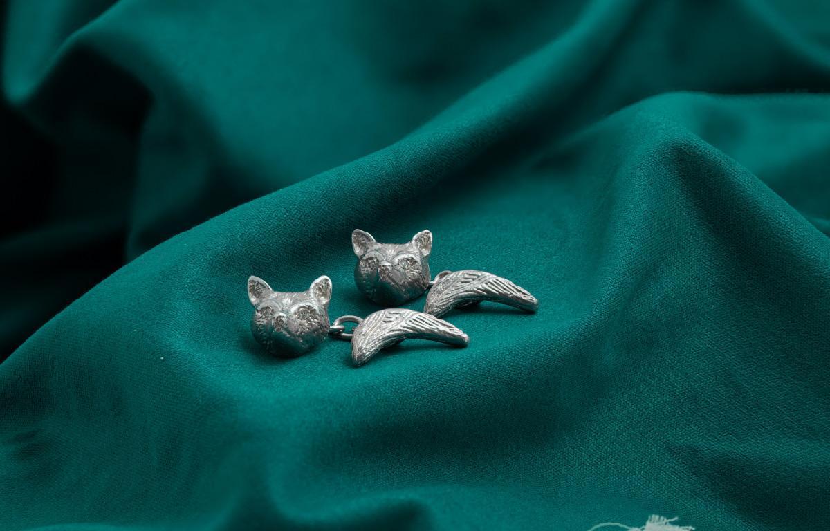 Bespoke silver fox head and tail cufflinks