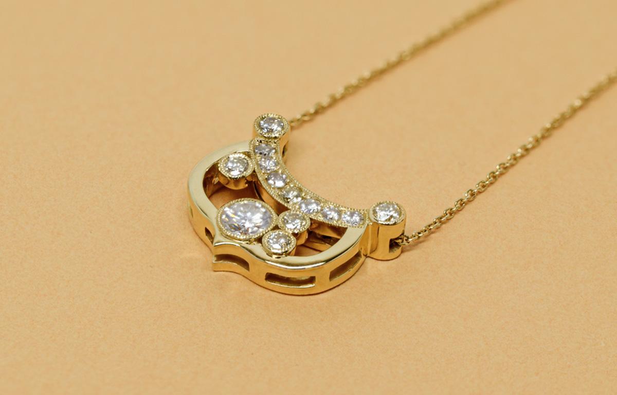 Bespoke yellow gold and diamond pendant