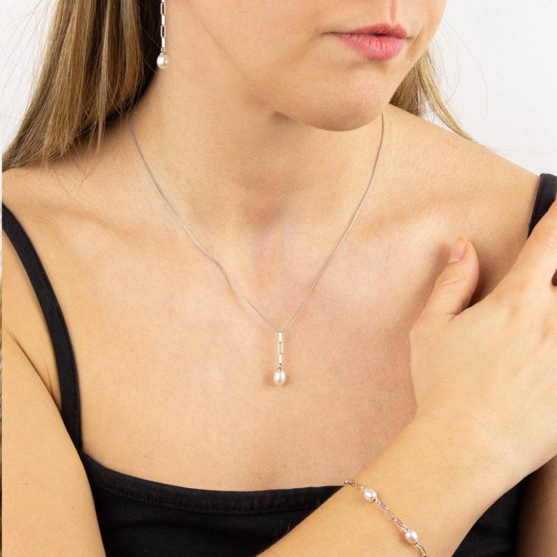 Fiorelli Silver Lady wearing Pearl Chain Drop Earrings, necklace and bracelet by Fiorelli Silver