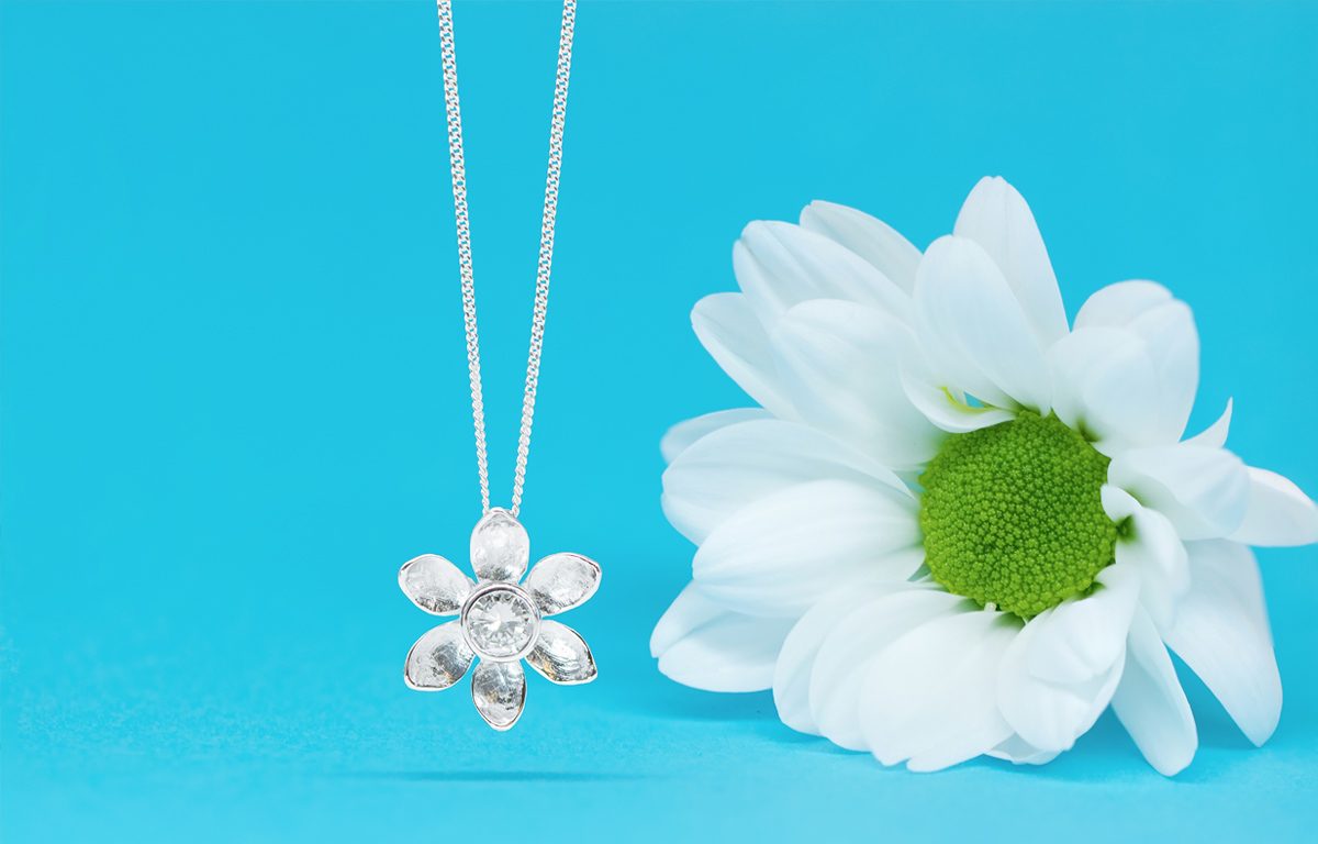 Bespoke white gold and diamond flower pendant